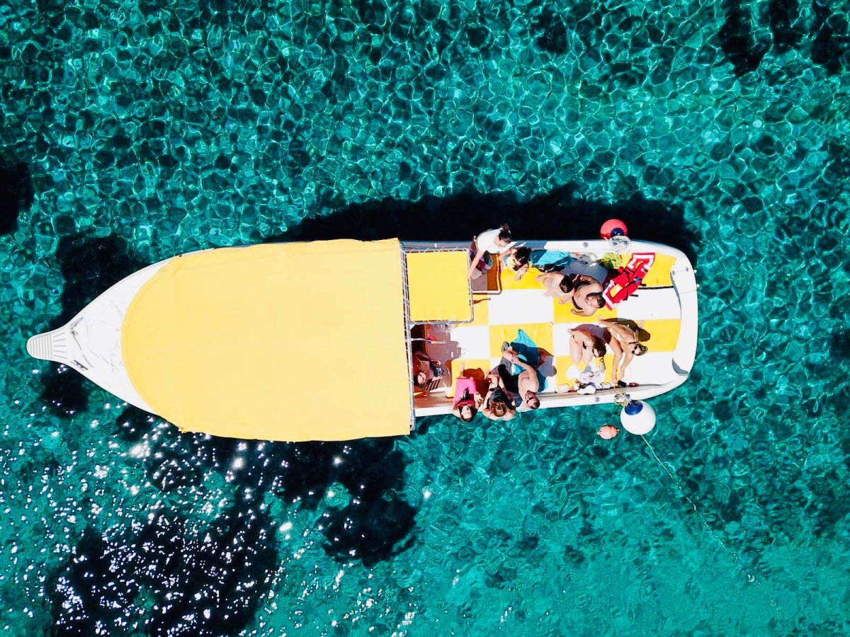 Aerial view of Enzo 35 sunbed and canopy on a Blue Cave charter