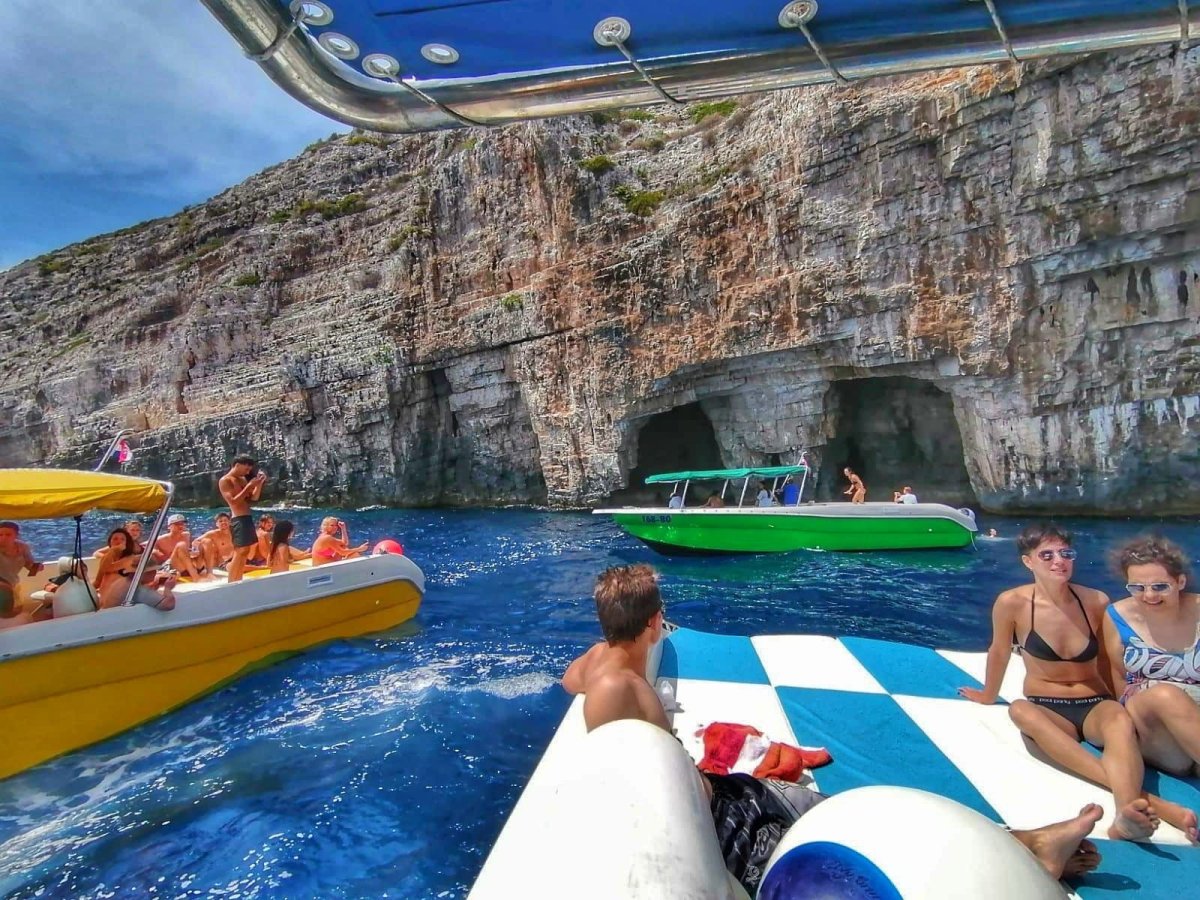 Stern view toward a sea cave from the Enzo 35 Blue Cave boat
