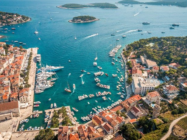 Aerial view of Hvar Town harbour with Pakleni Islands beyond