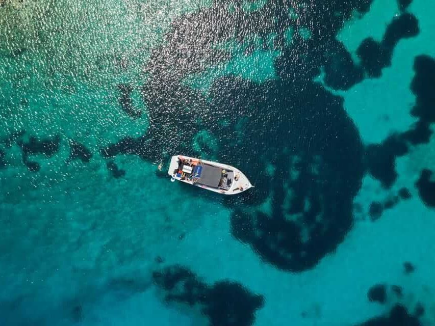 Private boat cruising along the Dalmatian coast on a Blue Cave day trip