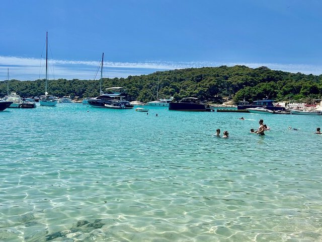 Crystal-clear swimming stop on a Blue Cave tour from Split